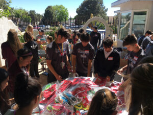 GOS Donation 09 Ecuador Gear Collection Event - University New Mexico of Women's Soccer Team with Boys and Girls Club Teams with Gift of Soccer Team Organizing Process