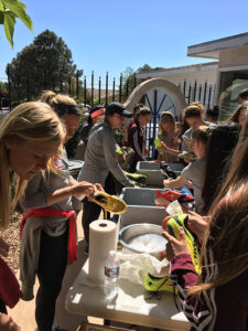 GOS Donation 09 Ecuador Gear Collection Event - University New Mexico of Women's Soccer Team and Girls Club Teams with Gift of Soccer Team Organizing Event