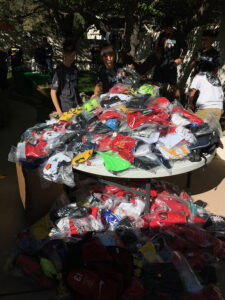 GOS Donation 09 Ecuador Gear Collection Event - Rio Rapids SC Soccer Teams with Gift of Soccer Team Organizing Event