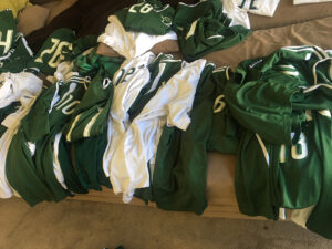 GOS Donation 19 Nigeria Gear Collection - Gift of Soccer Team Soccer Uniform Sorting on couches