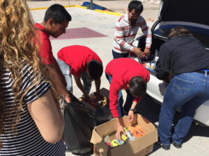 Gear Delivery - Mexican Volunteers delivering Gift of Soccer Gear