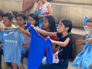 GOS Donation 23 Ecuador Gear Delivery - Kids With Soccer Uniforms